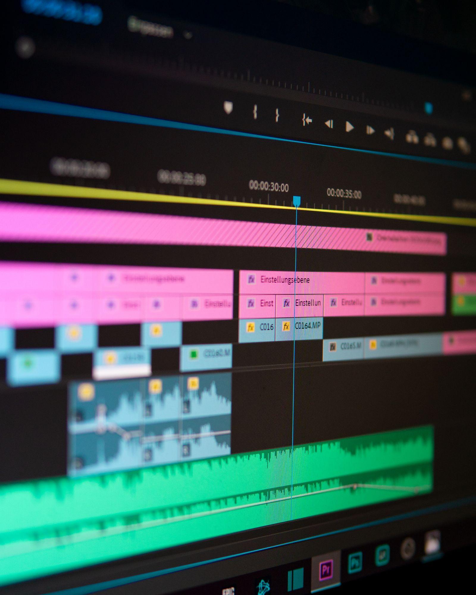 Professional video editing timeline during a captioning pass